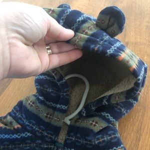 Infant onesie with hood